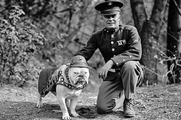 2nd Lt Lewis "Chesty" Puller with the first Marine Corps Mascot "Sgt. Maj. Jiggs" 1925