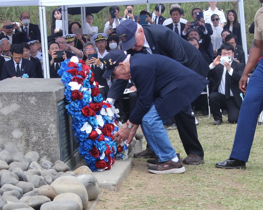 Joe places a wreath at Iwo Jima